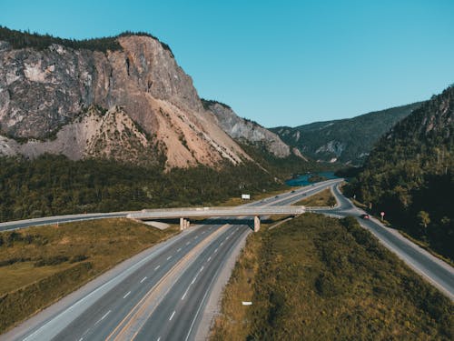 Asphalt Roads Between Mountains