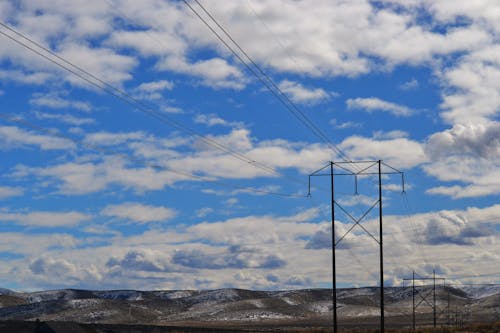 Electric Tower Under Cloudy Sky