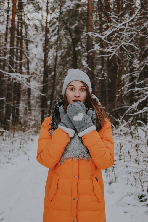 Beautiful Woman Wearing an Orange Winter Coat