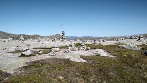 Stacks of Stones under a Blue Sky