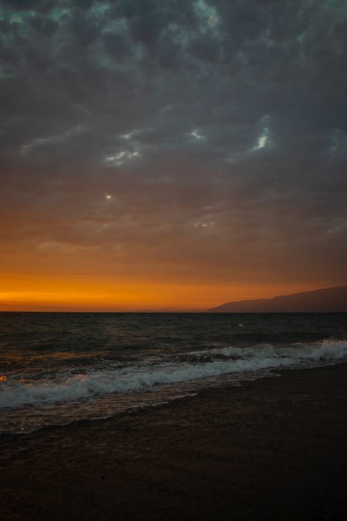 Immagine gratuita di bagnasciuga, crepuscolo, mare