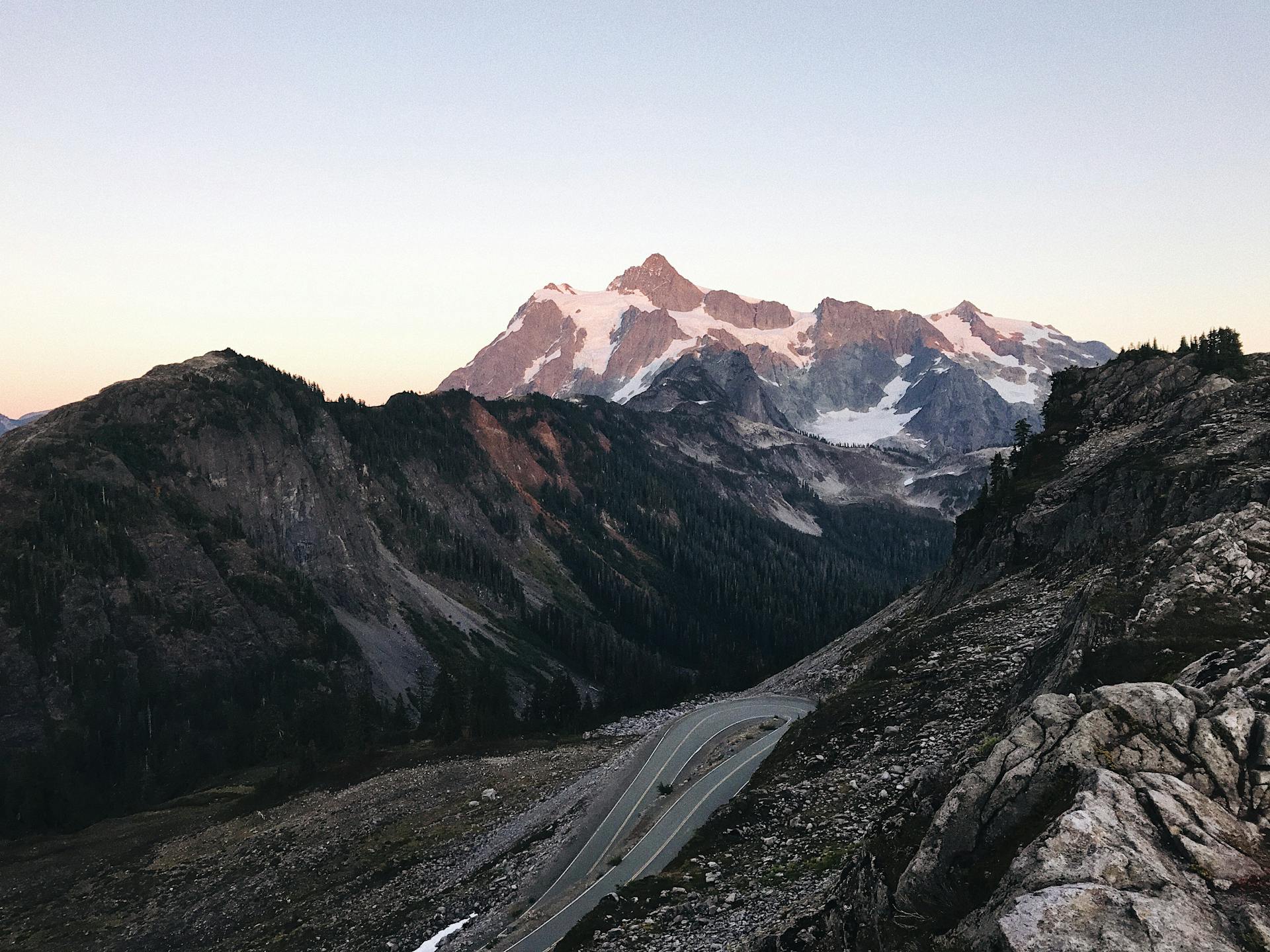 Breathtaking mountain landscape with a winding road in winter. Perfect for nature lovers.