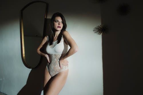 Woman Wearing White Bodysuit