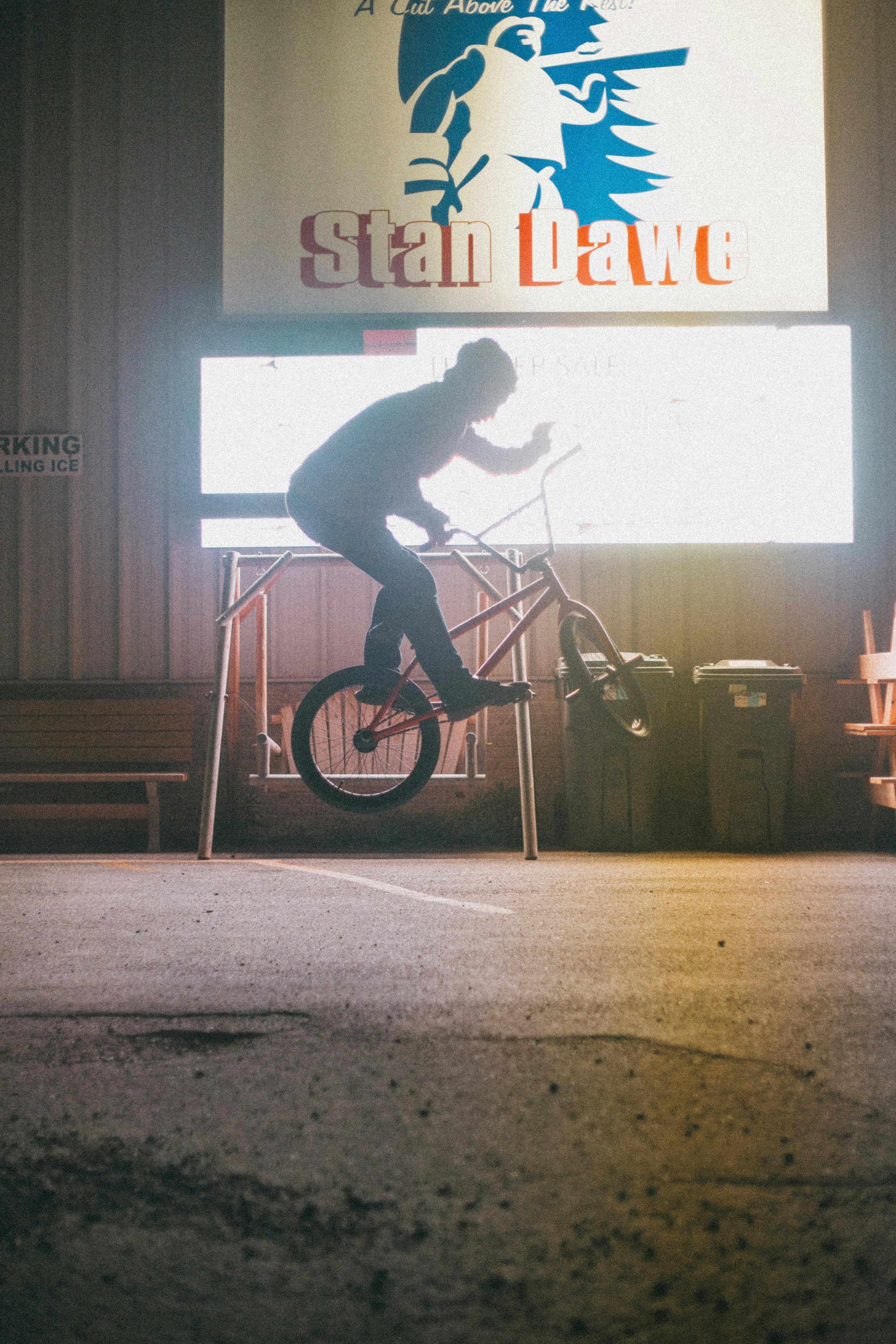 a person doing trick using bmx