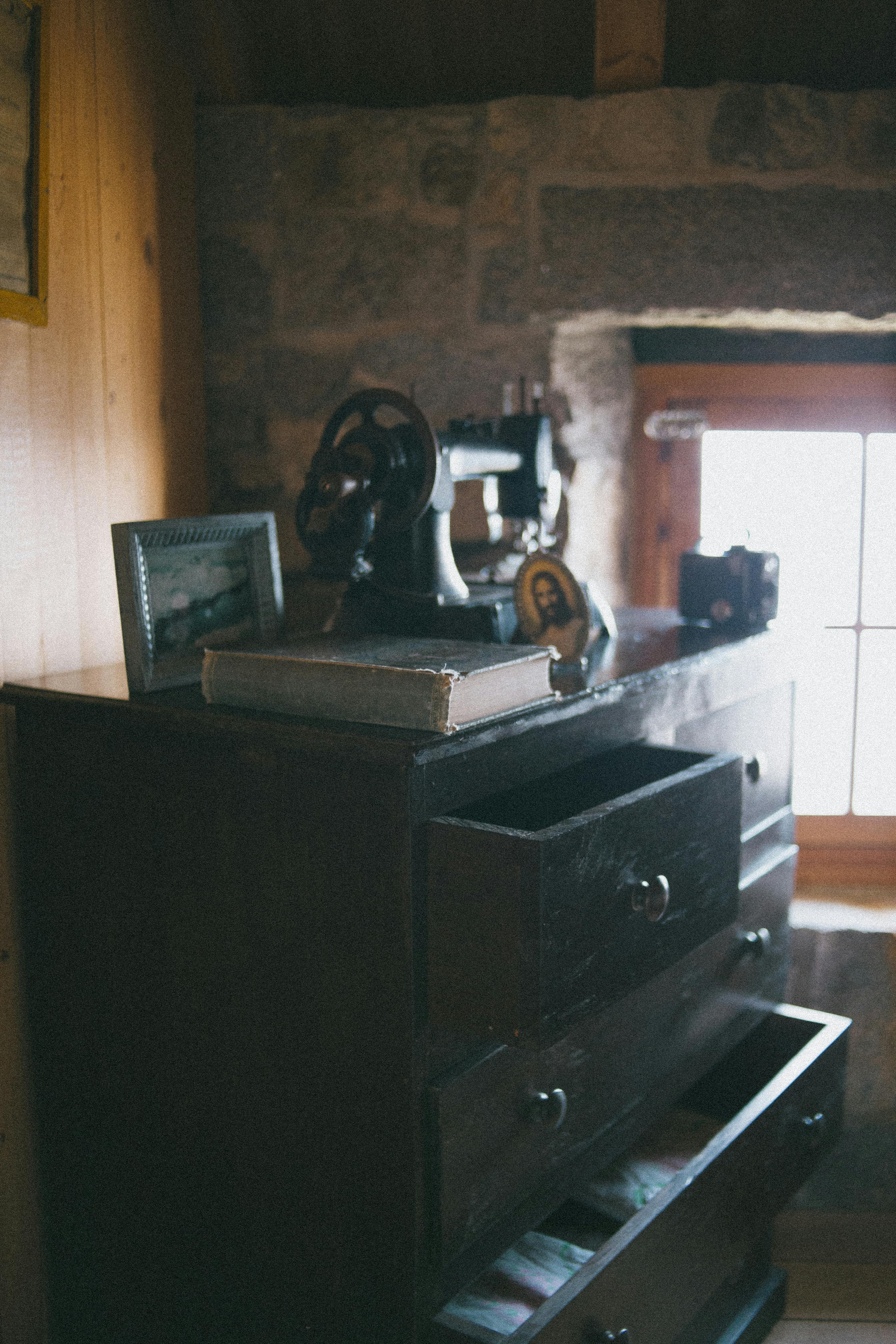 Black Wooden Drawer Near Wooden Frame Glass Window · Free Stock Photo