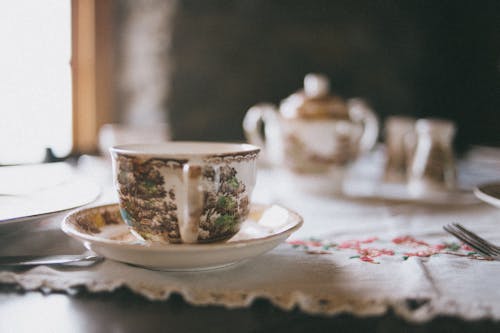 Free A Porcelain Tea Cup and a Saucer Stock Photo
