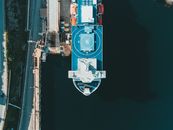 Aerial Photography of a Ship Near by the Wharf