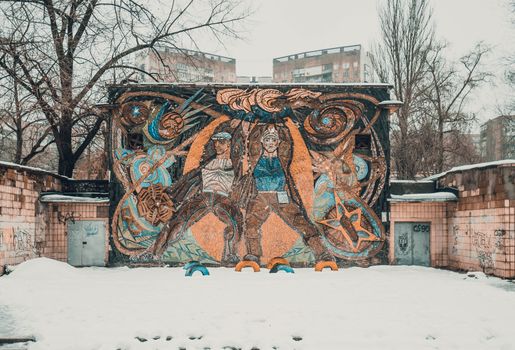 Brown and Black Graffiti on Wall