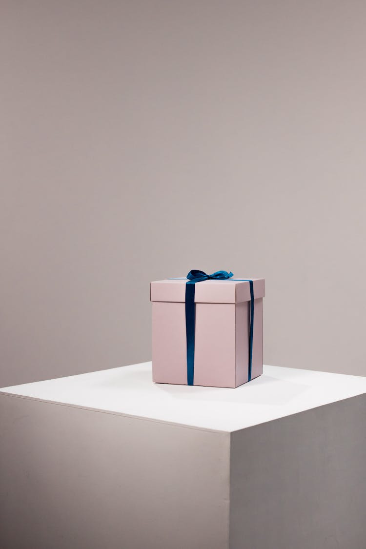 A Gift Box On A White Surface