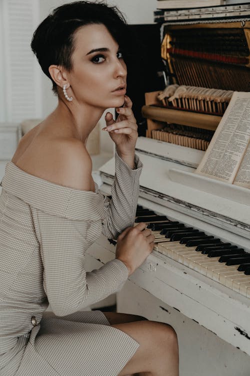 An Elegant Woman Playing Piano