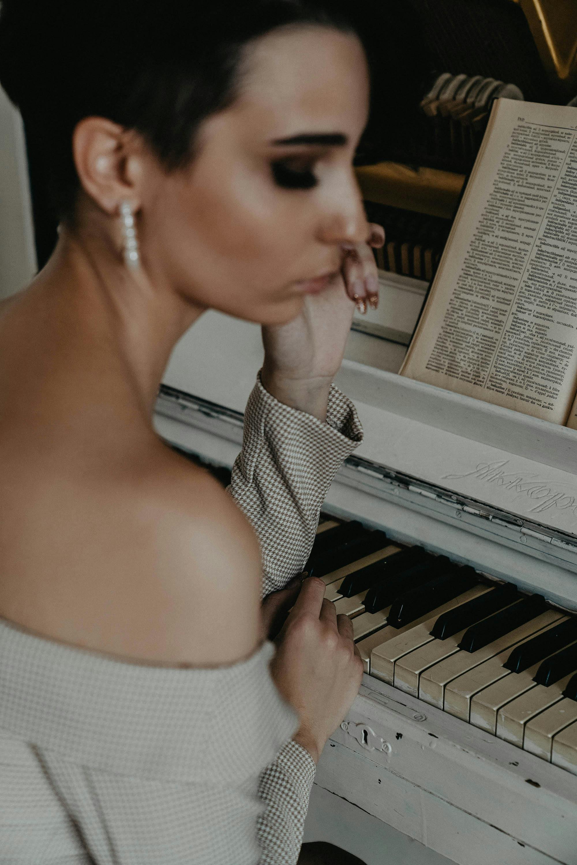 Pianist playing piano keys with focus and passion