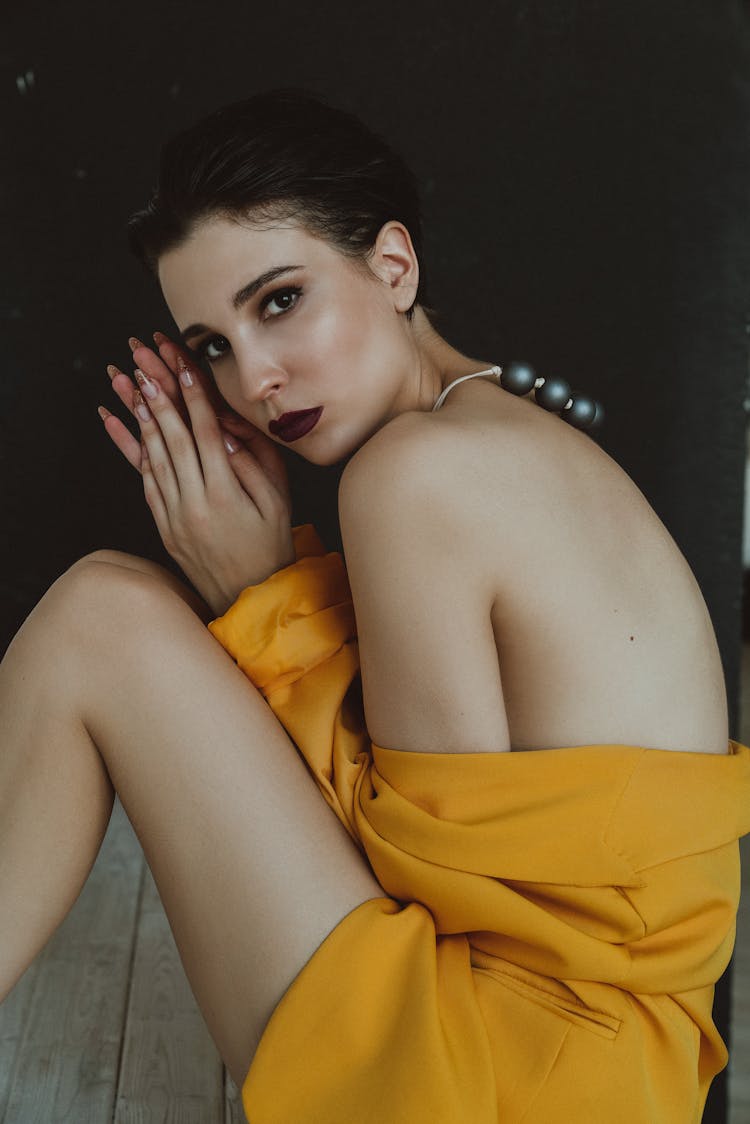 Woman In Yellow Dress With Bare Back