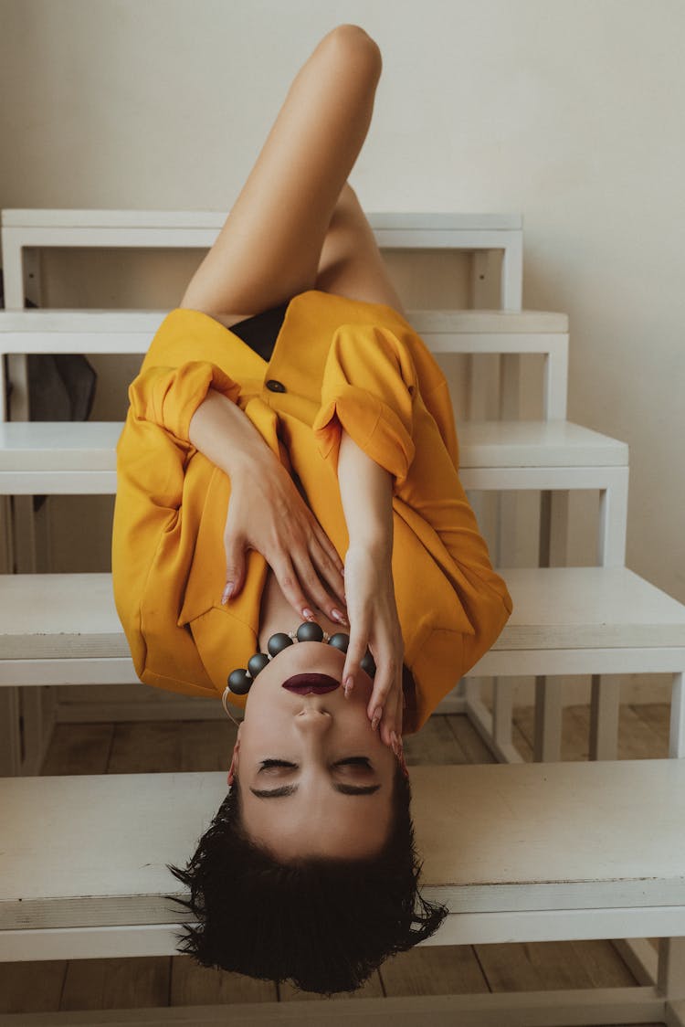 Woman Lying On White Steps