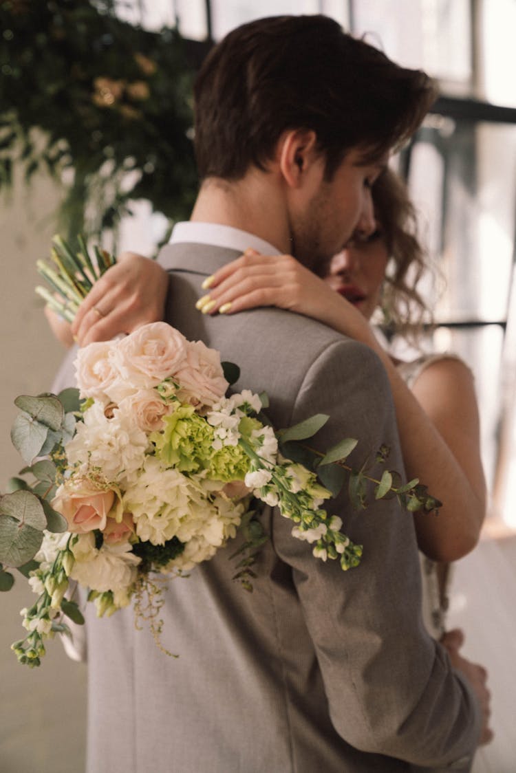 Close-up Photo Of Newlywed Couple