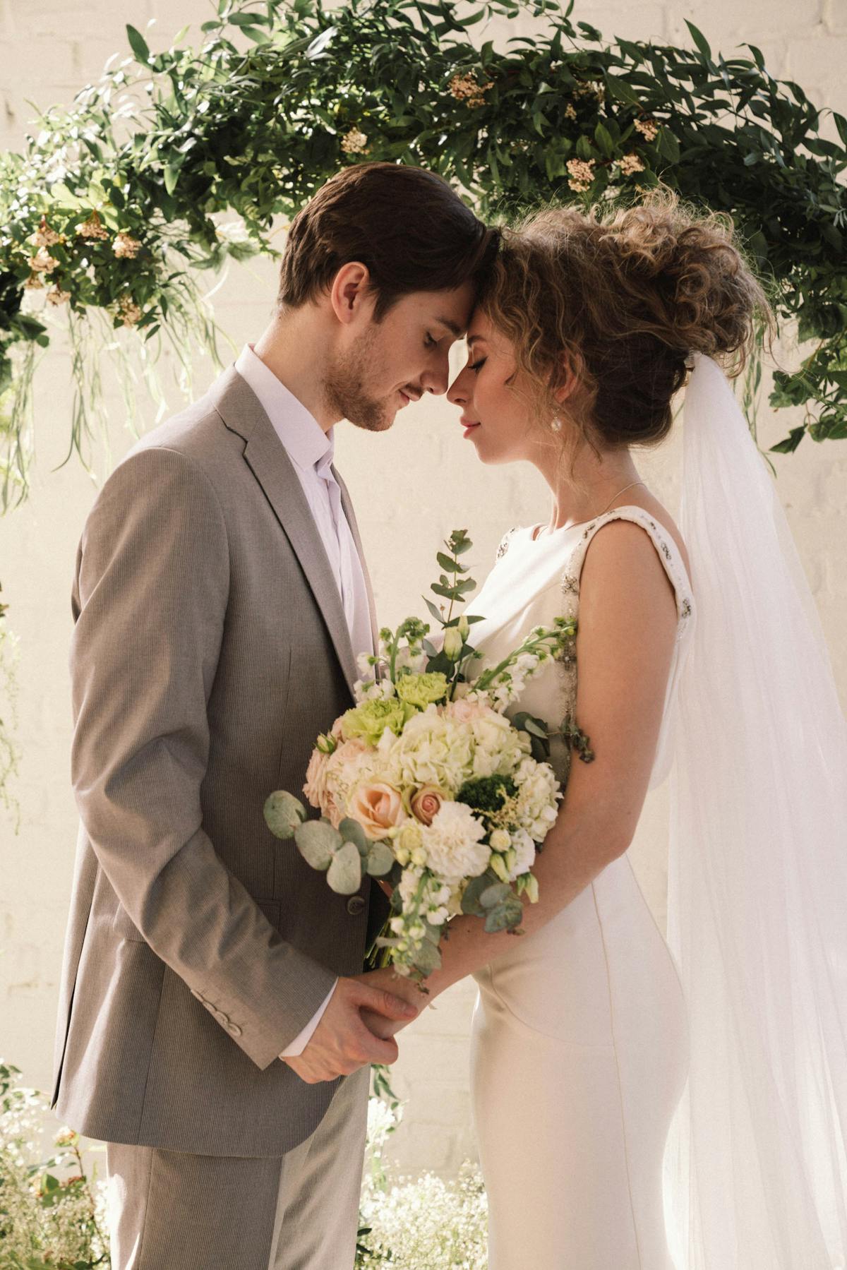 Doctor explaining measles risks to a concerned parent and child
