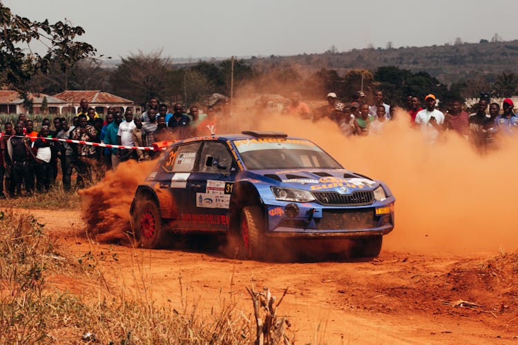 Blue Racing  Car On Race Track