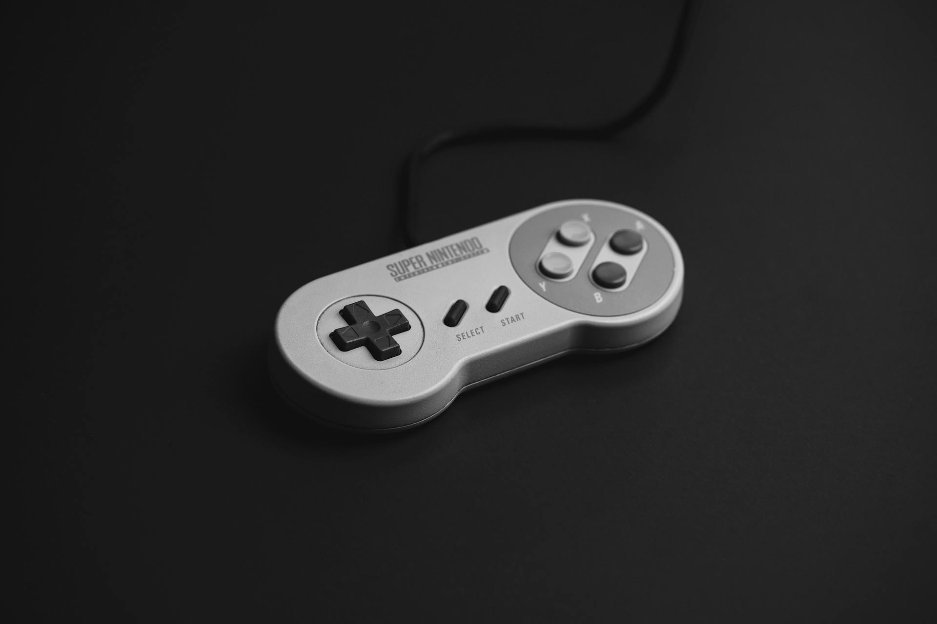 Close-Up Shot of a Super Nintendo Game Controller