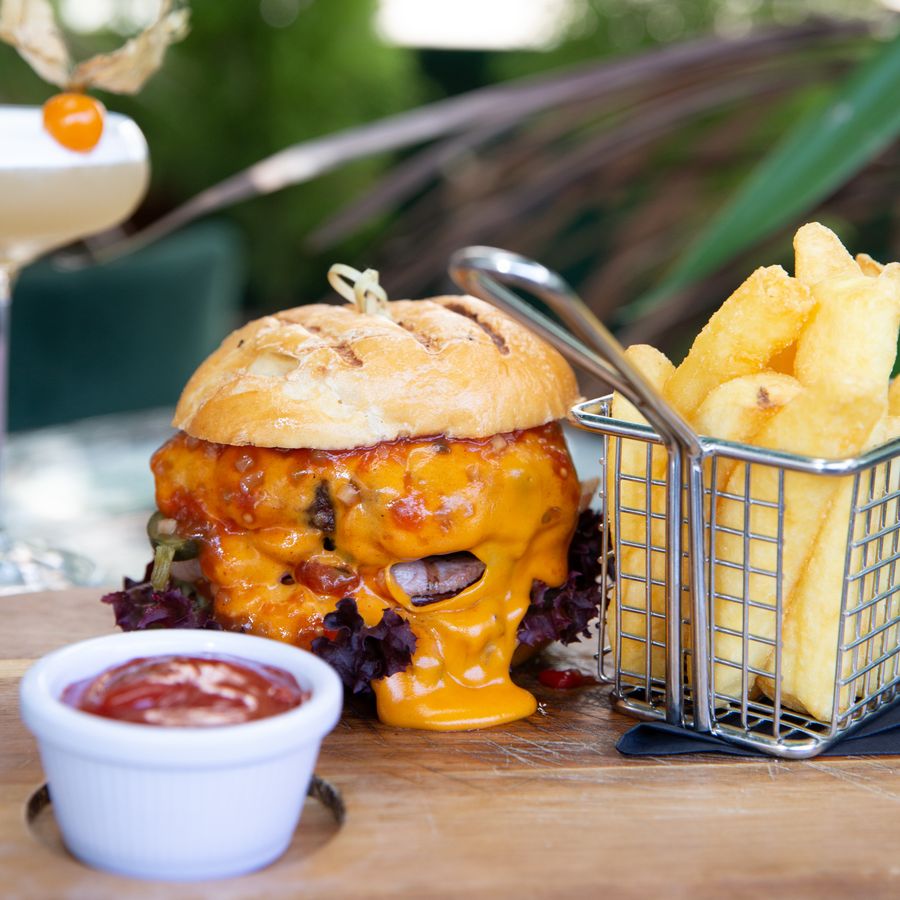 Cheeseburger served with crispy fries — photo by The Castlebar on Pexels