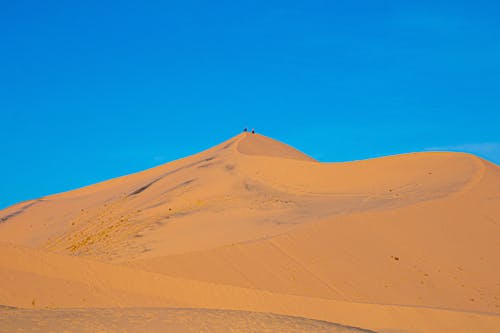 Brown Sand Under Blue Sky