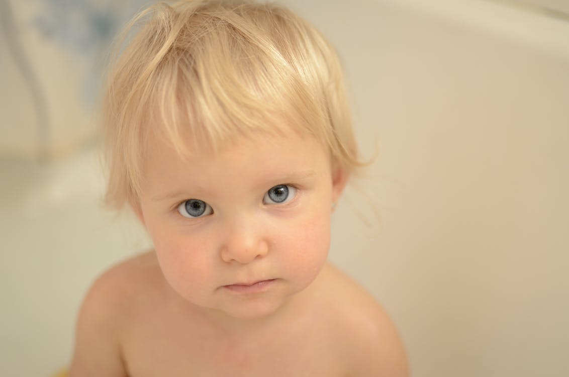 Free Topless Baby With Blue Eyes Stock Photo