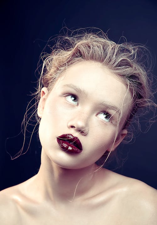 Woman with Lipstick Looking Up