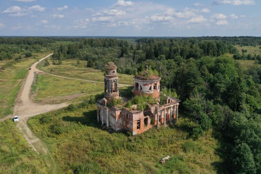 Explore the captivating ruins of an ancient building in Klinsky District, Russia, captured from above.