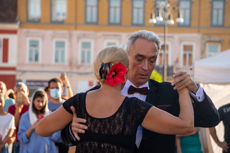 An Elegant Elderly Couple  Dancing