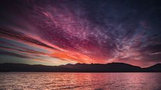 Body of Water Under the Dramatic Sky