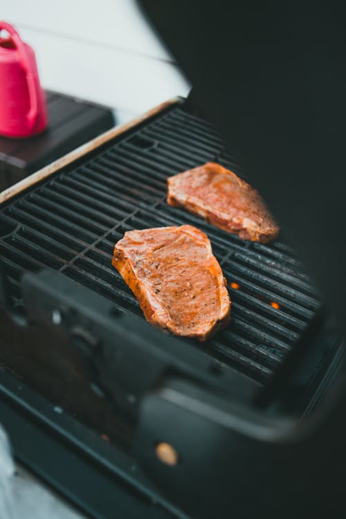 Free Grilling of Steak Stock Photo