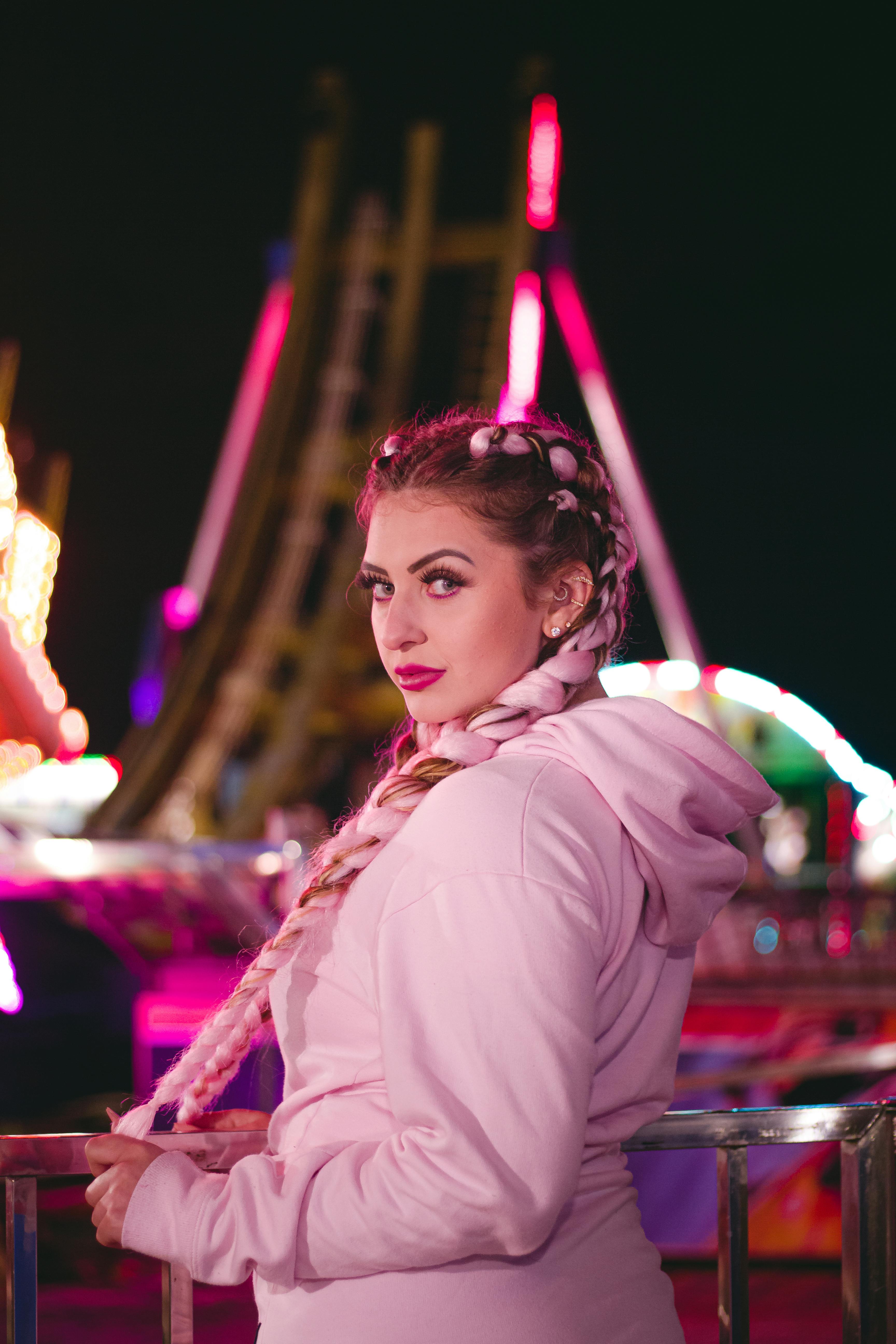 Girl in Hoodie Holding Her Hair · Free Stock Photo