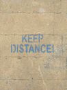 A Warning Painted on Concrete Wall