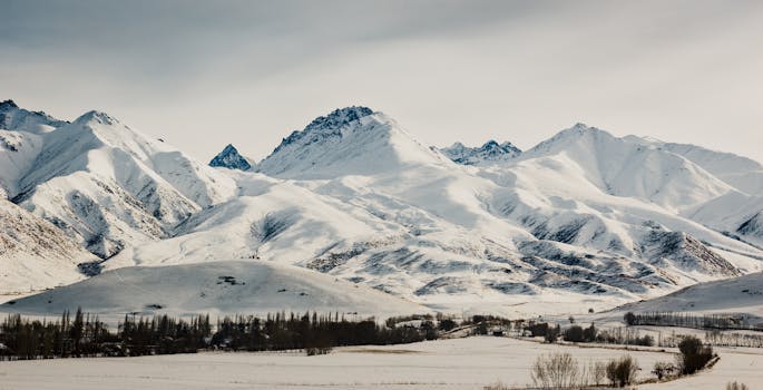 Tranquil winter landscape of snowy mountains in Ak-Talaa, Kyrgyzstan.