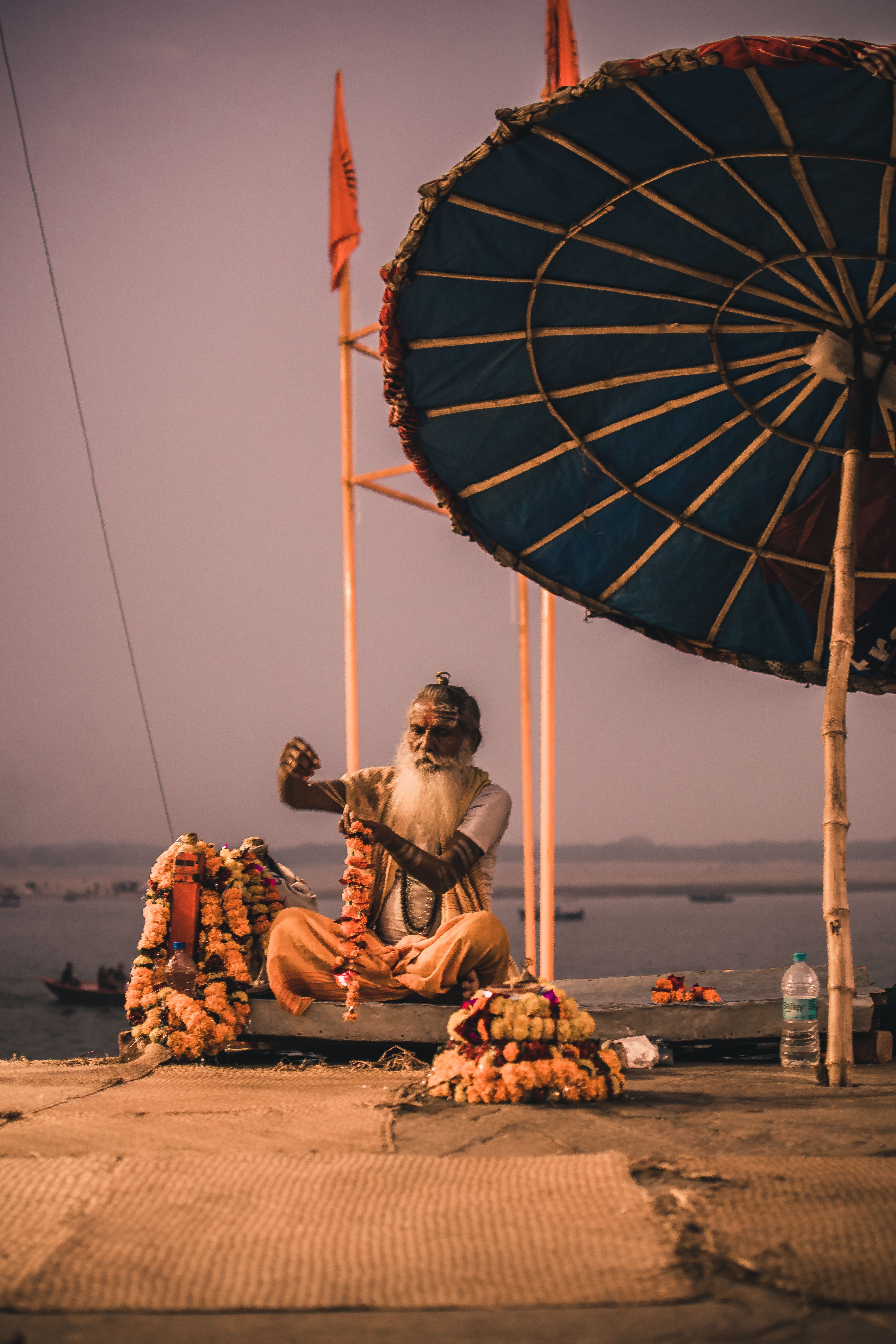 Man with Beard Sitting and Performing Ritual · Free Stock Photo