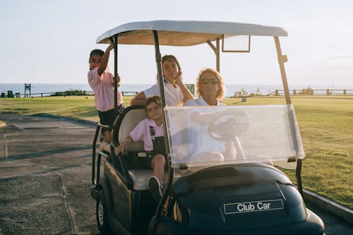 People in a Golf Cart