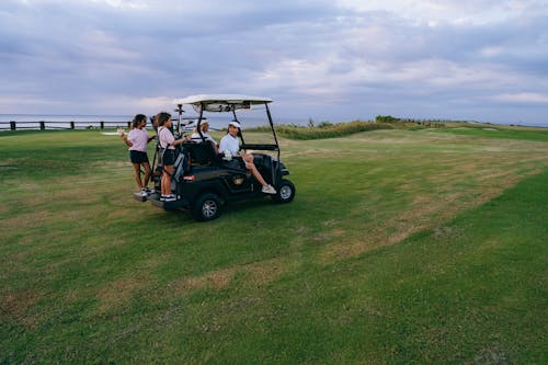 Gratis arkivbilde med buggy, familie, golfbane