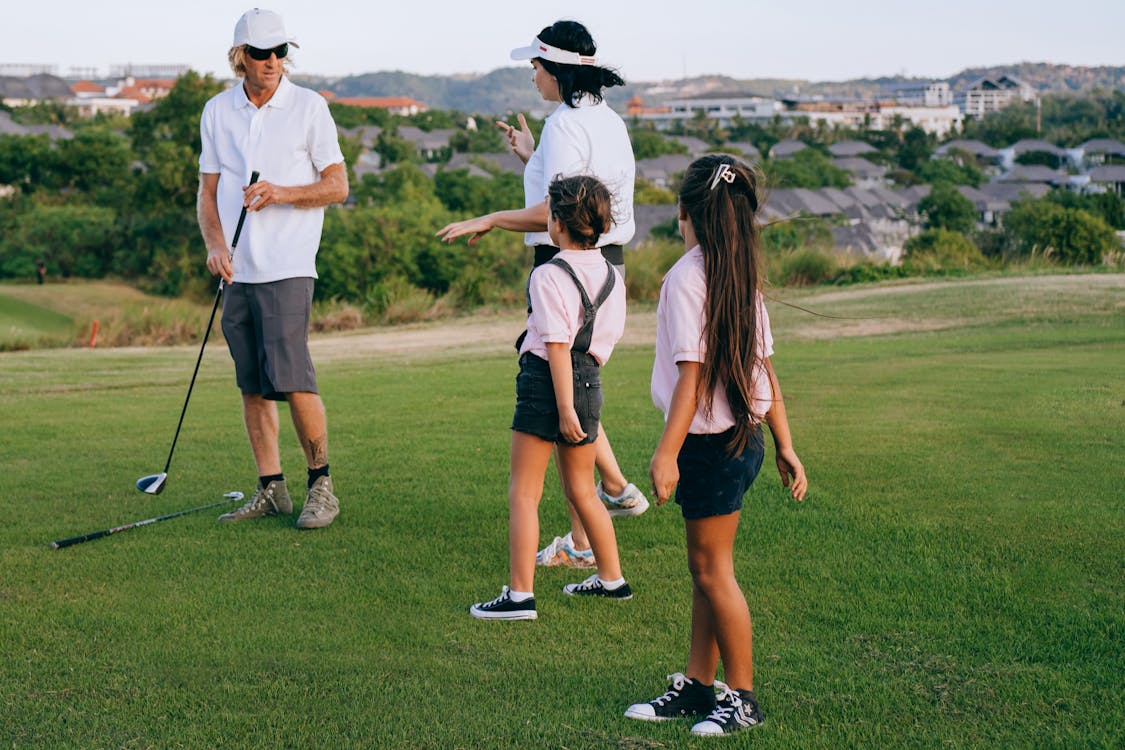 Free A Family Playing Golf Stock Photo