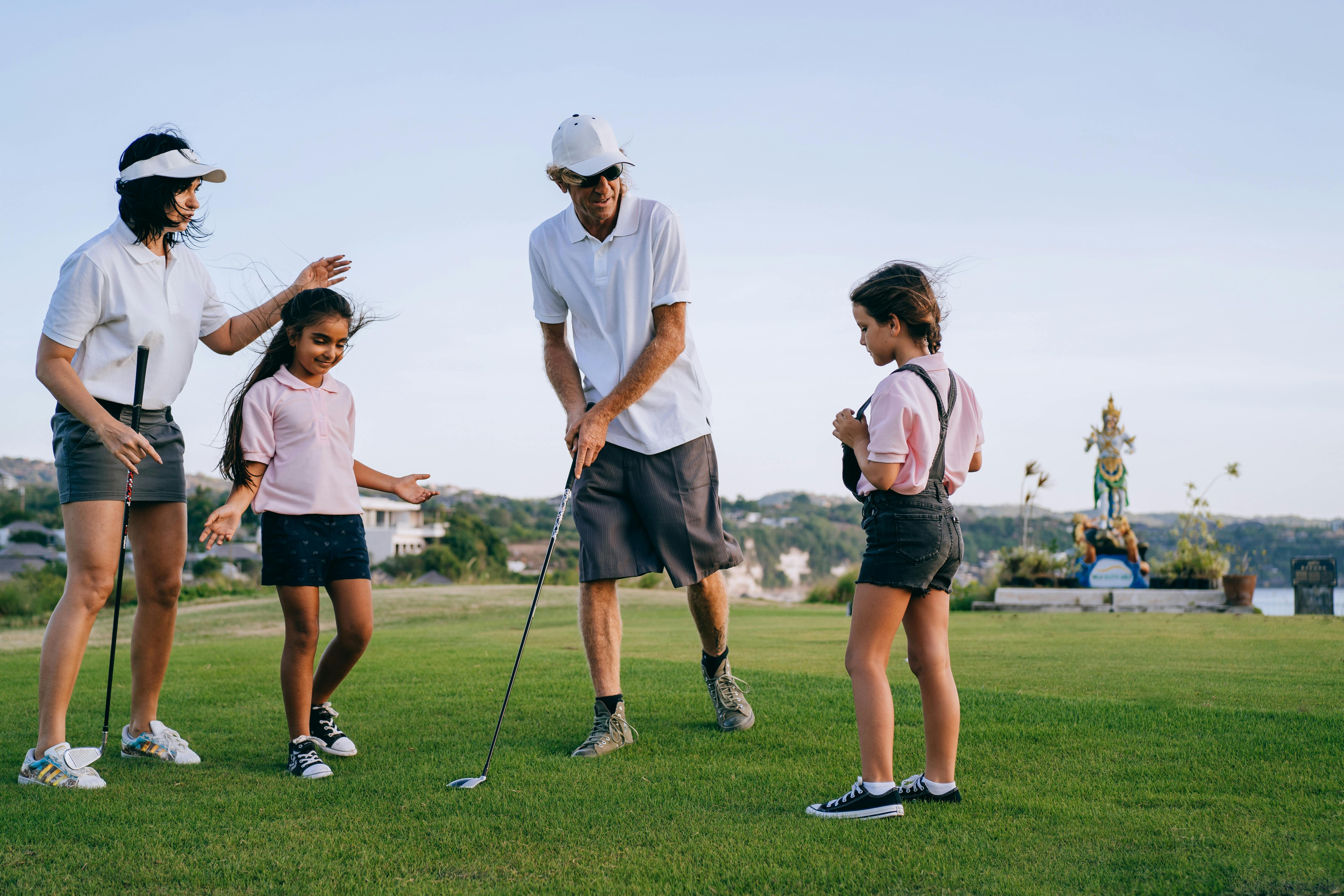 Free Family Playing Golf Stock Photo