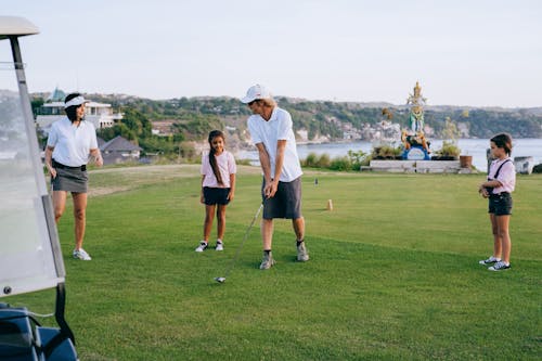Free Happy Family Playing Golf Stock Photo