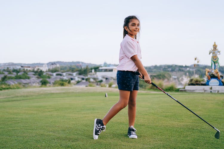 
A Girl Playing Golf