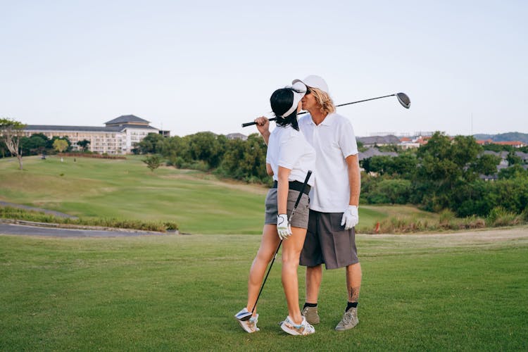 
A Couple Kissing On A Golf Course