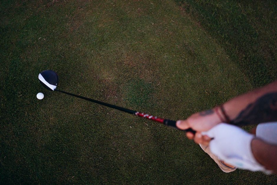 Professional services | Premier Private Rides Elberton Resort Golfer tees up golf ball