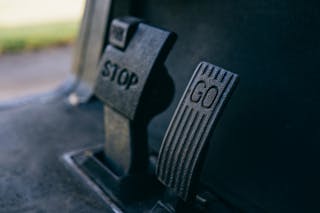 
A Close-Up Shot of Golf Cart Pedals