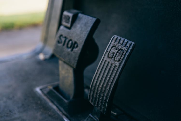 
A Close-Up Shot Of Golf Cart Pedals