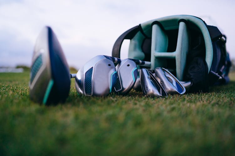 A Golf Clubs On The Grass