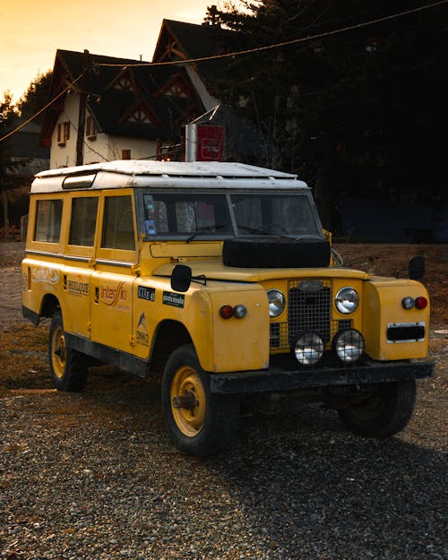 Free Yellow Vintage Land Rover on Road Stock Photo