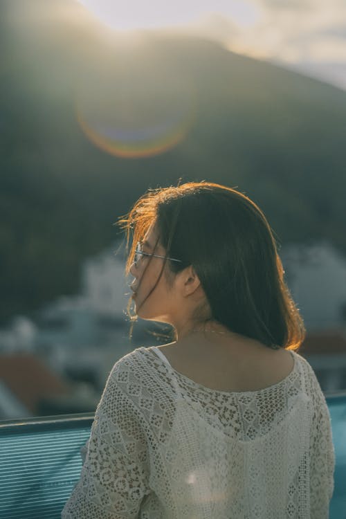 Woman in White Lace Shirt