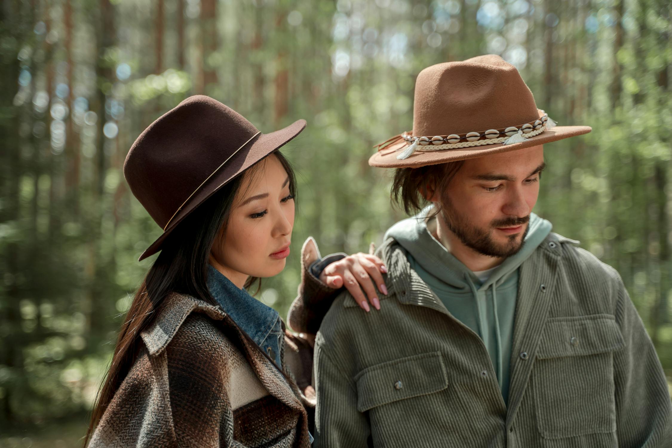 A Couple Wearing Jackets and Hats · Free Stock Photo