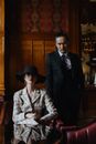 Man and Woman in an Elegant and Formal Attire