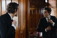 Man fixing his Necktie