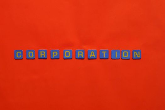 Blue tiles spelling 'corporation' on a bold red background, concept art.